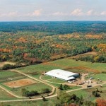 Meadowbrook Stables — community stable with warm rustic character